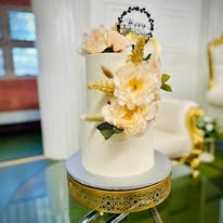 Elegant tiered wedding cake with sugar flowers