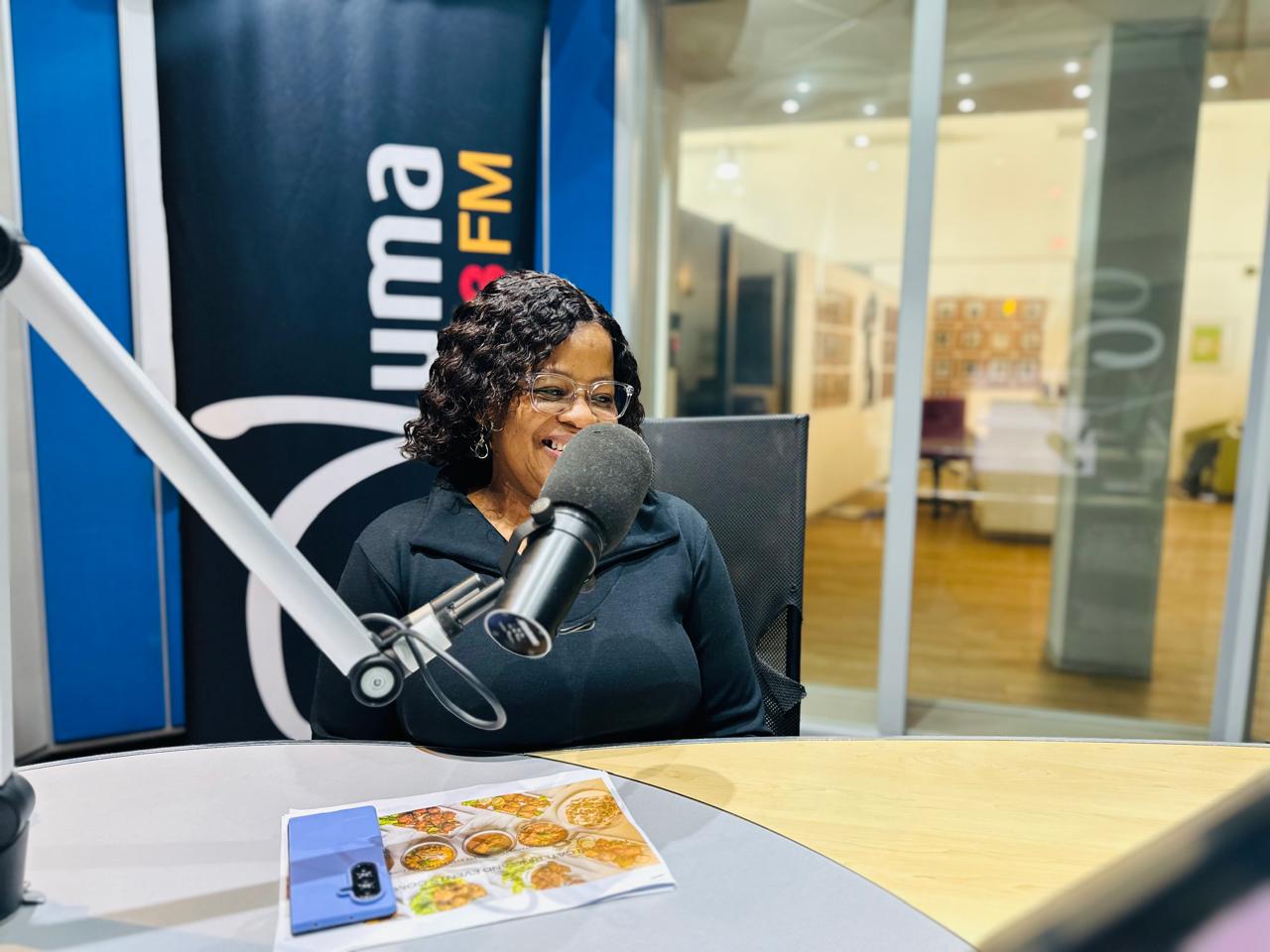 Candid moment at the Vuma 103FM studio