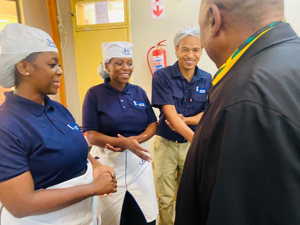 The Ntokazi Catering team with the President of South Africa